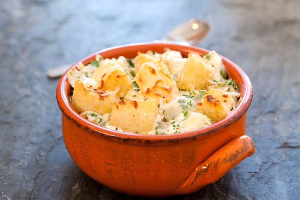 Artichoke Crab Dip With Fried Yuca Chunks And Monterey Jack Cheese
